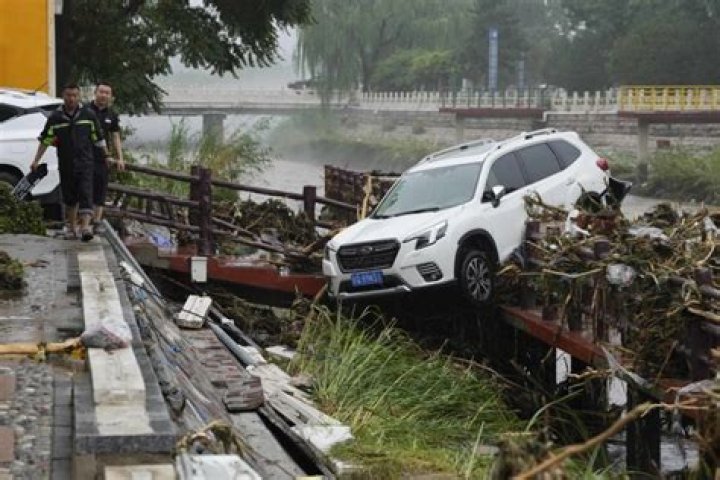 20 dead and 27 missing in China rain