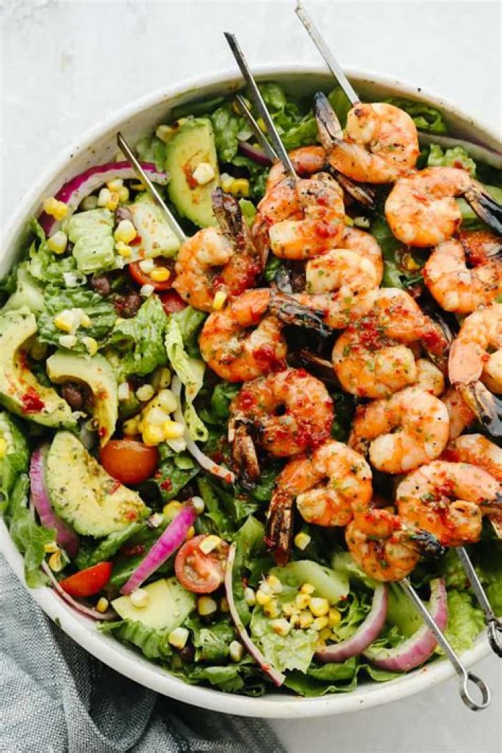 Need salad inspiration? Try this grilled shrimp summer harvest salad with basil vinaigrette recipe