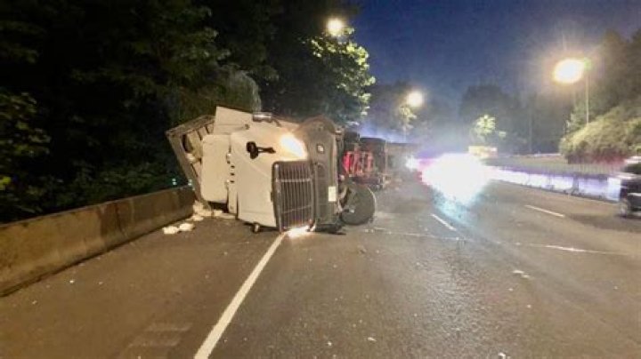 Semi truck hauling live chickens rolls over on NB I-5, delays traffic